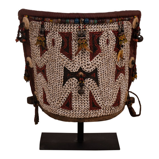 Baby carrier with beads and shells on stand sideview